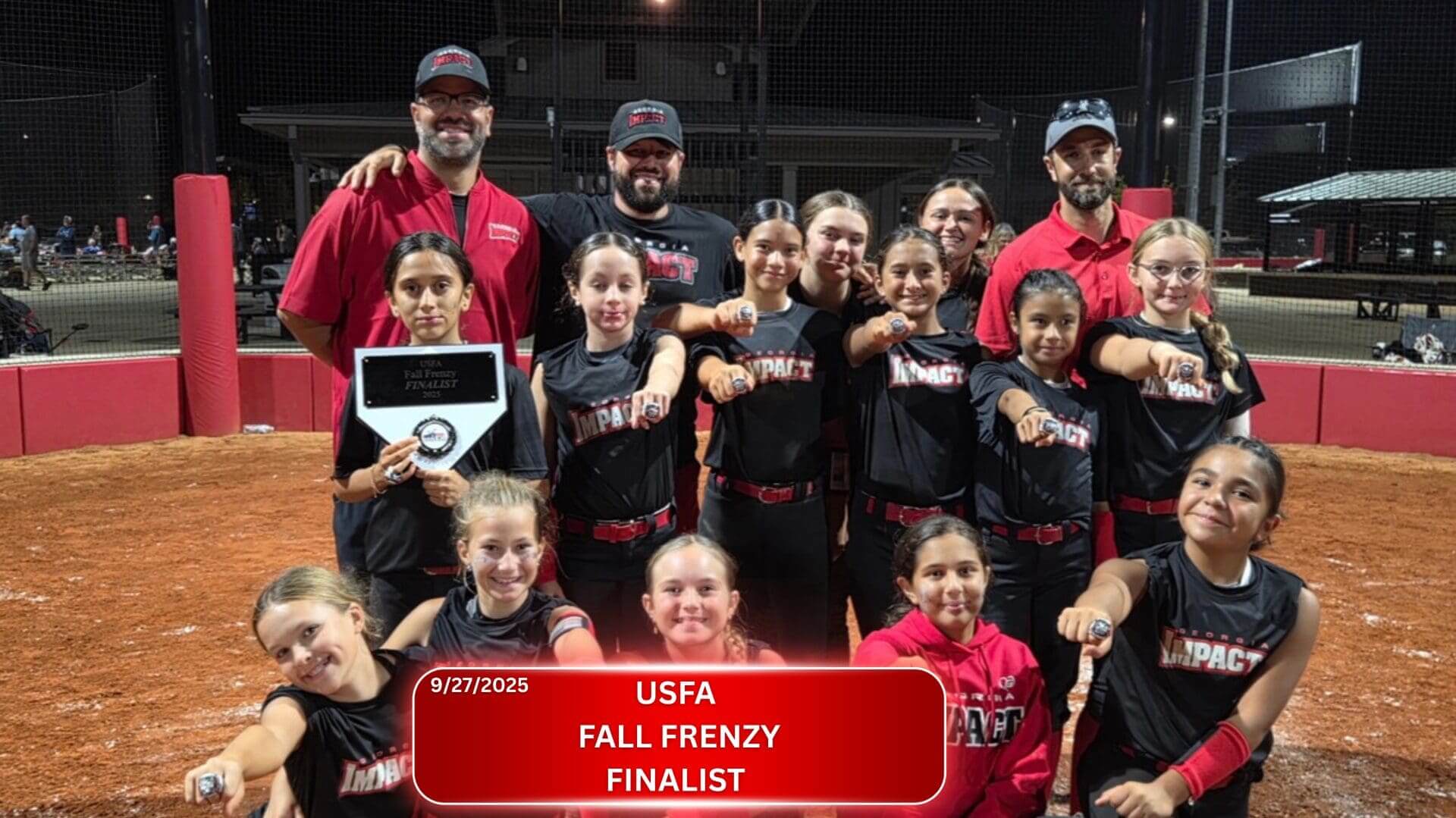 Youth cheerleading team posing with a finalist award.
