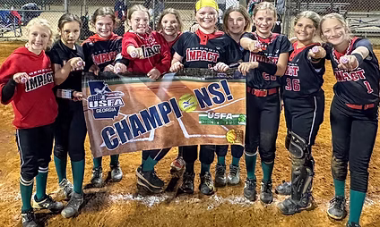 Girls youth softball team holding champions banner