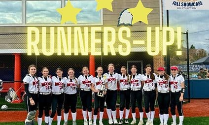 Softball team posing with runners-up sign.