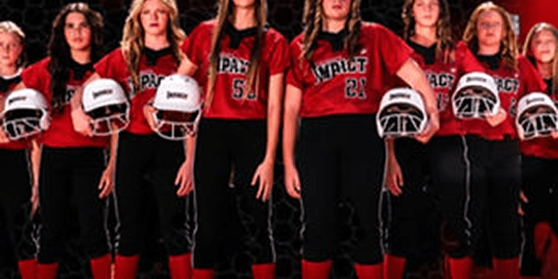 Softball team in red and black uniforms.