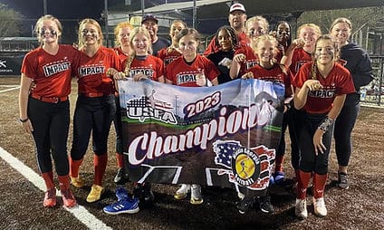 Youth softball team holding 2023 champions banner