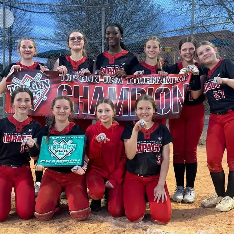 Girls' softball team celebrating tournament victory.