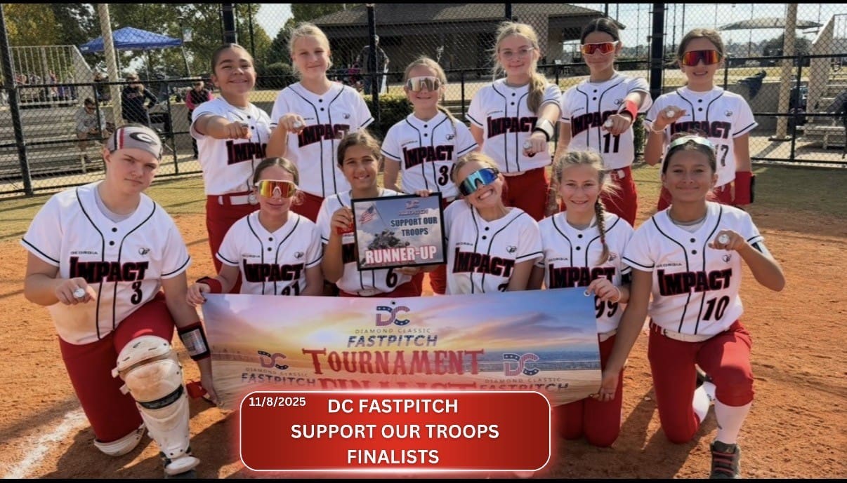 Youth baseball team holding a support sign for troops.
