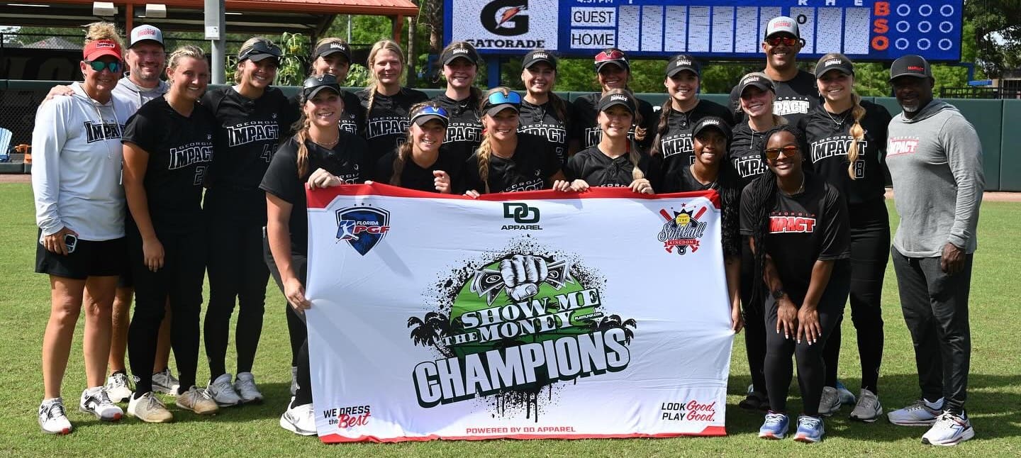 Youth baseball team proudly holding their championship banner.